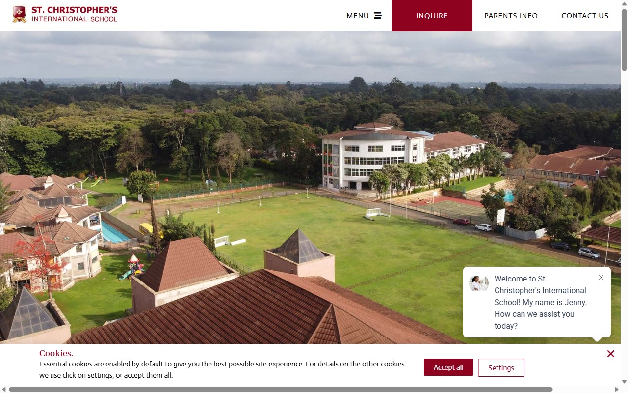 St. Christopher's International School homepage with the AI chat widget we built